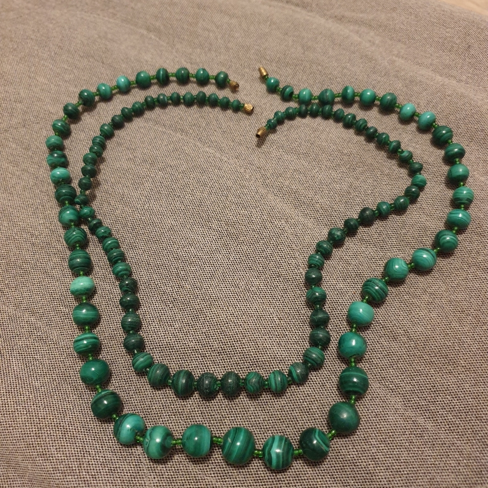 Two malachite necklaces.